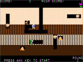 In game image of Dig Dug on the Apple II.