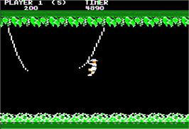 In game image of Jungle Hunt on the Apple II.