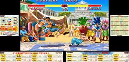 Artwork for Super Street Fighter II: The Tournament Battle.