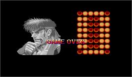 Game Over Screen for Super Street Fighter II: The Tournament Battle.