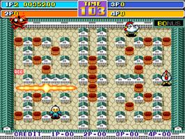 In game image of Bomber Man World / New Dyna Blaster - Global Quest on the Arcade.