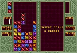 In game image of Columns II: The Voyage Through Time on the Arcade.