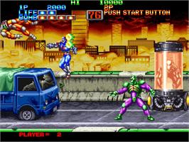 In game image of Eight Man on the Arcade.