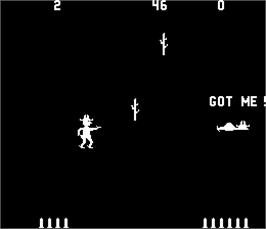 In game image of Gun Fight on the Arcade.