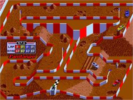 In game image of Ironman Ivan Stewart's Super Off-Road on the Arcade.