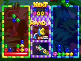 In game image of Mausuke no Ojama the World on the Arcade.