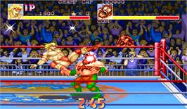 In game image of Muscle Bomber: The Body Explosion on the Arcade.