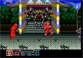 In game image of Ninja Combat on the Arcade.