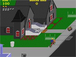 In game image of Paperboy on the Arcade.