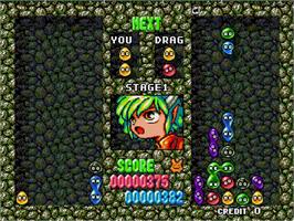 In game image of Puyo Puyo on the Arcade.