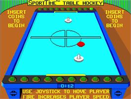 In game image of SportTime Table Hockey on the Arcade.