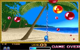 In game image of Super Buster Bros. on the Arcade.