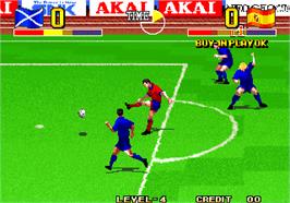 In game image of The Ultimate 11 - The SNK Football Championship / Tokuten Ou - Honoo no Libero on the Arcade.
