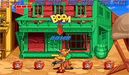 In game image of Wild West C.O.W.-Boys of Moo Mesa on the Arcade.