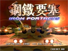 Title screen of Gongtit Jiucoi Iron Fortress on the Arcade.
