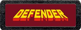 Top of cartridge artwork for Defender on the Atari 2600.