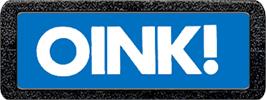 Top of cartridge artwork for Oink! on the Atari 2600.