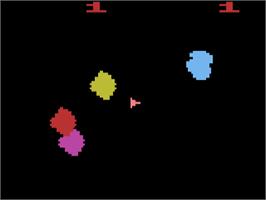 In game image of Asteroids on the Atari 2600.