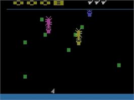 In game image of Cosmic Swarm on the Atari 2600.