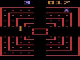 In game image of Dodge 'em on the Atari 2600.