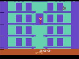In game image of Elevator Action on the Atari 2600.