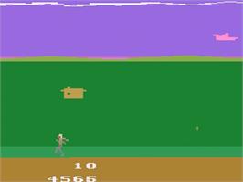 In game image of Joust on the Atari 2600.