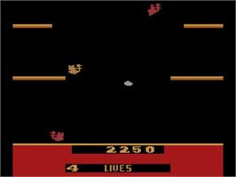 In game image of Joust on the Atari 2600.