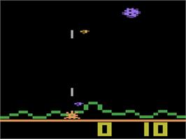 In game image of Laser Blast on the Atari 2600.