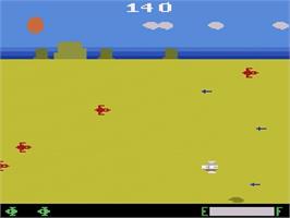In game image of Planet Patrol on the Atari 2600.