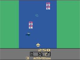 In game image of River Raid on the Atari 2600.