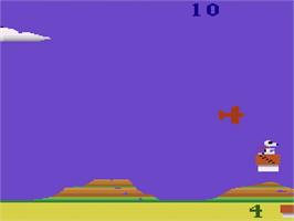 In game image of Snoopy and the Red Baron on the Atari 2600.