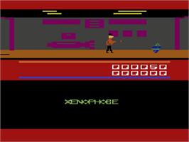 In game image of Xenophobe on the Atari 2600.