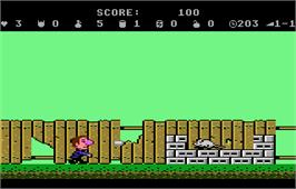 In game image of Scrapyard Dog on the Atari 7800.