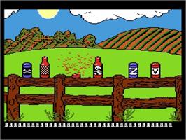 In game image of Barnyard Blaster on the Atari 8-bit.