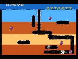 In game image of Dig Dug on the Atari 8-bit.