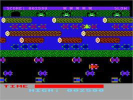 In game image of Frogger on the Atari 8-bit.