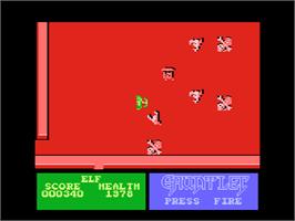 In game image of Gauntlet on the Atari 8-bit.