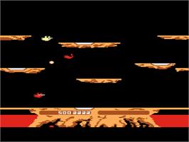 In game image of Joust on the Atari 8-bit.