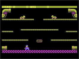 In game image of Mario Bros. on the Atari 8-bit.