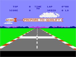 In game image of Pole Position on the Atari 8-bit.