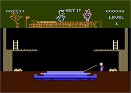 In game image of Porky's on the Atari 8-bit.