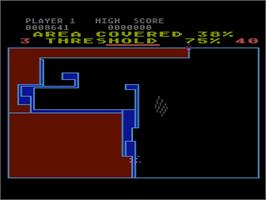 In game image of QIX on the Atari 8-bit.