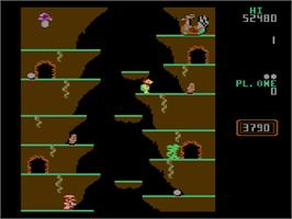 In game image of Tales Of Dragons And Cavemen on the Atari 8-bit.