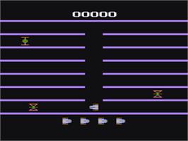 In game image of Turmoil on the Atari 8-bit.