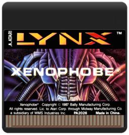 Cartridge artwork for Xenophobe on the Atari Lynx.