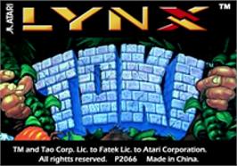 Top of cartridge artwork for Toki: Going Ape Spit on the Atari Lynx.