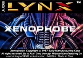 Top of cartridge artwork for Xenophobe on the Atari Lynx.