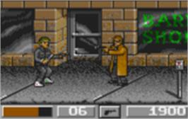 In game image of Dirty Larry - Renegade Cop on the Atari Lynx.
