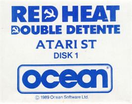 Top of cartridge artwork for Red Heat on the Atari ST.