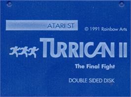 Top of cartridge artwork for Turrican II: The Final Fight on the Atari ST.